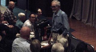 Harry Butler standing amongst the crowd of his In the Wild West Lecture Almost 'In The Wild', Dr W.H. (Harry) Butler, WA Museum Fellow Image copyright WA Museum